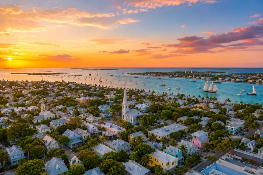 Key West from above at sunset, with the harbour and historic streets.